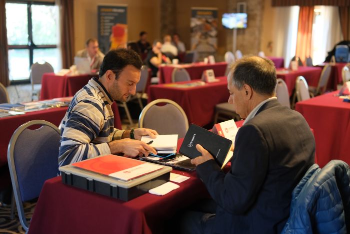 Video thumbnail with people sitting at a table in an event venue
